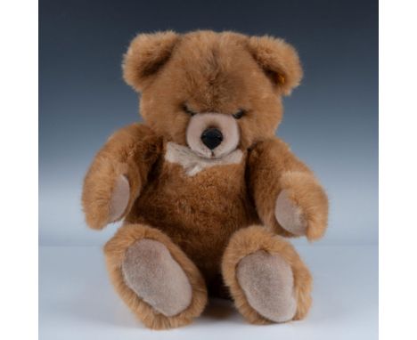 Beautiful large fluffy teddy bear from Steiff. Comes with original button in ear and cloth tag. This item has its original bo