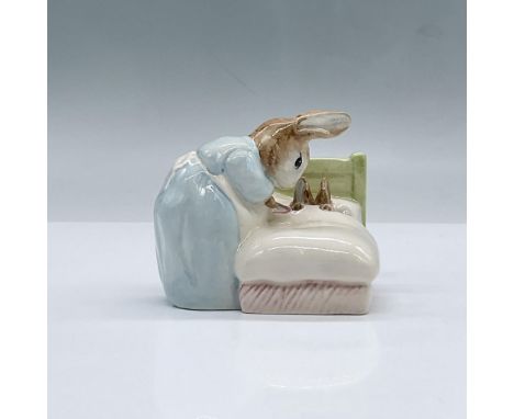 Glossy porcelain. Features a rabbit leaning over a bed with a small bunny under the covers. Royal Albert Beatrix Potter backs