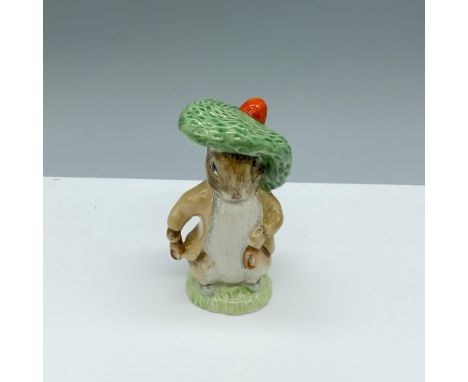 Glossy porcelain figure of a rabbit donning a large green beret. Royal Albert Beatrix Potter backstamp. This item has its ori