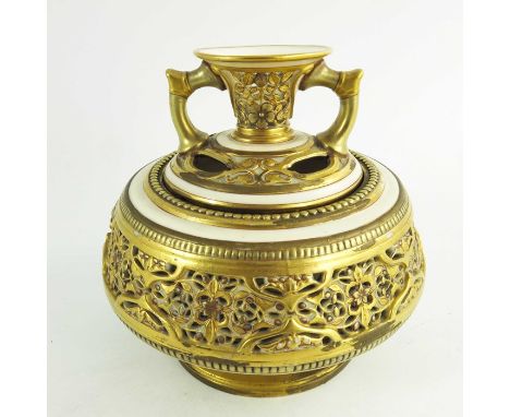 A Royal Worcester reticulated potpourri vase, circa 1882, relief moulded and pierced with Persian style floral bands, possibl