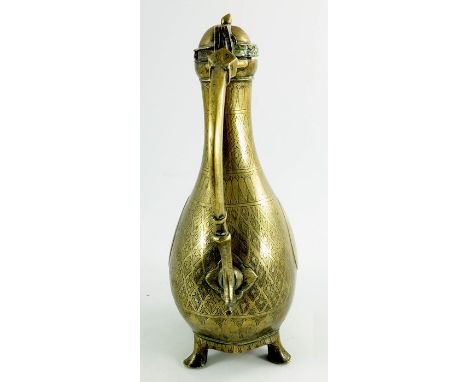 An 18th century Mughal ewer or coffee pot (Aftaba), cast brass with engraved decoration, probably Punjab / Lahore with unusua