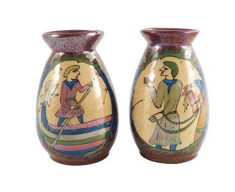 Louis Etienne Desmant, a matched pair of French faience Bayeux Tapestry lustre vases, circa 1890, ovoid form with conical nec