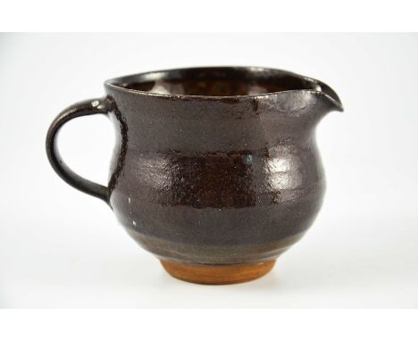 Margaret Leach for Wye Valley, a studio pottery jug, brown treacle glaze, impressed mark, 9cm high