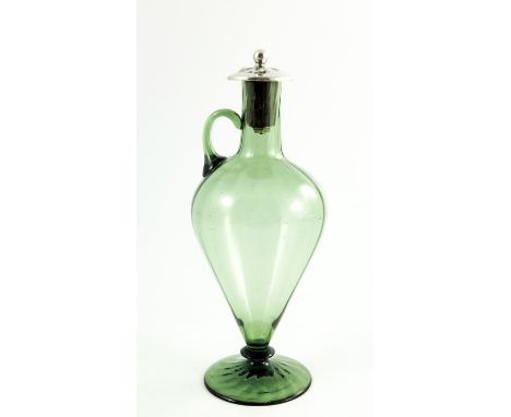 Harry Powell for James Powell and Sons, Whitefriars, an Arts and Crafts glass and silver mounted ewer, William Hutton and Son