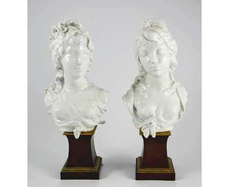 Arnold Machin O.B.E., R.A. for Royal Worcester, a pair of limited edition busts of 'Night and Day', with certificate, the pai