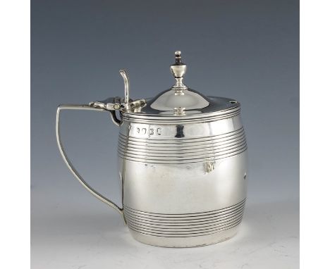 Stephen Adams, London 1805, a George III silver mustard pot of barrel form with reeded decoration, and with reeded handle and