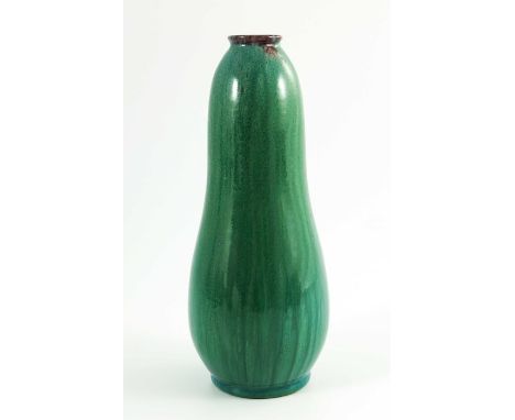 Pilkington, a Royal Lancastrian Transmutation glazed vase, circa 1900, elongated double gourd form, green fruit skin draining