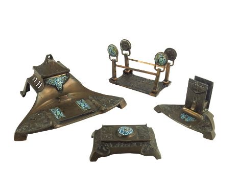 A Jugendstil copper and cloisonné enamelled desk set, cast with stylised roses and set with mosaic type panels of enamel, som