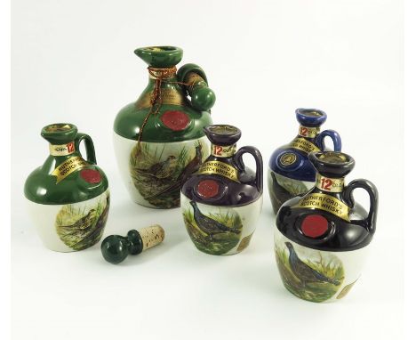 Rutherford's 12 year old Scotch whisky, a group of five variously sized ceramic flagons (5)