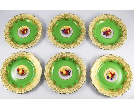 A set of six Royal Worcester fruit painted cabinet plates, 1937, by Harry Ayrton, of shaped hexagonal form with gilt gadroone