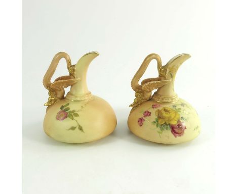 Royal Worcester a pair of blush ewers, 1898, squat form, dragon handle, shape 1048, painted floral sprays gilt trim, 10cm hig