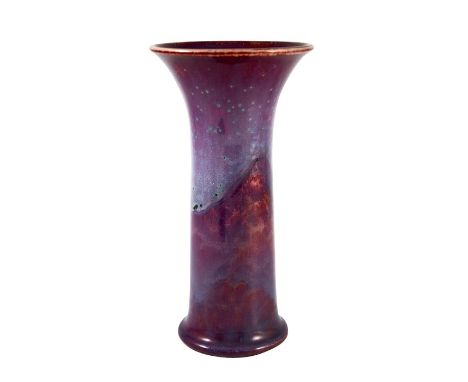 William Howson Taylor for Ruskin, a large high fired vase, 1932, waisted trumpet form, purple glazed with oxidised tide mark 