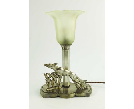 An Art Deco silvered lamp, with opalescent frosted shade, modelled with leaping dog and wheat, 31cm high