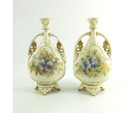 Royal Worcester a pair of blush ivory vases, circa 1890, teardrop footed form, shape 1142, painted wisteria sprays gilt trim,