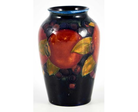 William Moorcroft, a small Pomegranate on blue vase, circa 1928, shouldered form, impressed mark and underglaze green monogra