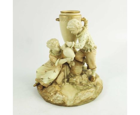 A Royal Worcester blush ivory ground figure group vase, circa 1888, after a model by James Hadley, modeled as a boy and girl 