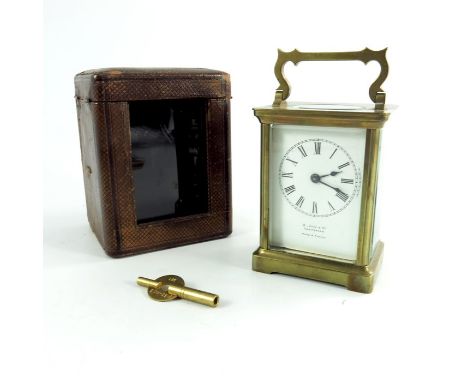 A Brass Encased French Carriage Clock, marked 'Jack &amp; Co, Cheltenham' Made in France to the dial, with original fitted le
