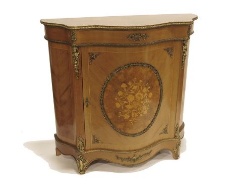A Continental walnut credenza, serpentine form, central burr roundel with marquetry floral bouquet, on cabriole bracket feet,