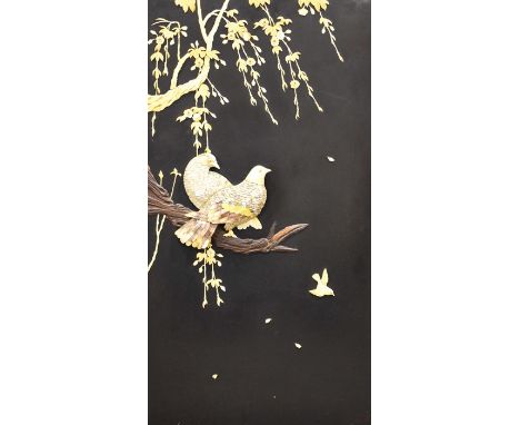 A 19th century Japanese Shibayama panel, modelled with two doves on a branch with blossom above, in bone, wood and abalone, 9