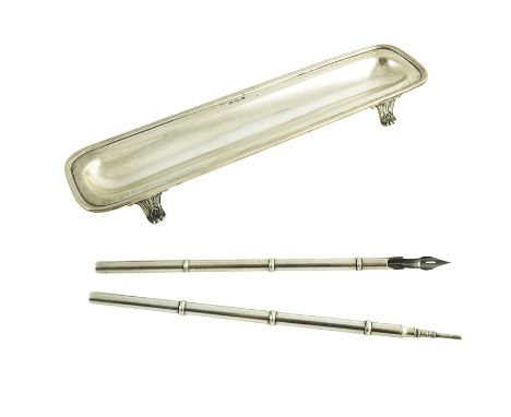 An Edwardian silver pen tray and two silver pens, Ellis and Co., Birmingham 1908, rectangular form on four acanthus and shell