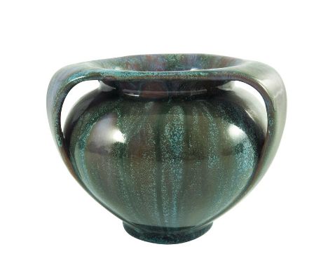 Pilkington, a Royal Lancastrian opalescent curdled vase, 1911, triple handled amphoral form, purple over mottled green drip g