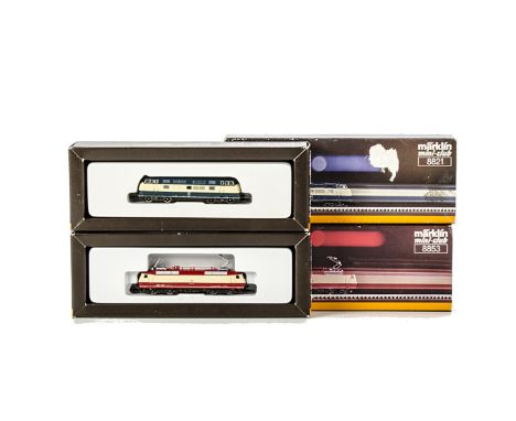Two Märklin Z Gauge DB Locomotives: comprising ref 8821 diesel in blue/cream livery and 8853 electric in red/fawn, both G-VG,