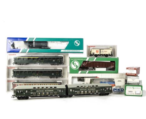 A Collection of Continental Rolling Stock by Assorted Makers: including 3 Swiss coaches and a 40-Jahre commemorative van by F