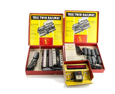 Two 1950's Trix Twin Railway 00 Gauge 3-rail AC Set Boxes with Locomotives and Stock:  comprising a BR Passenger set with gre