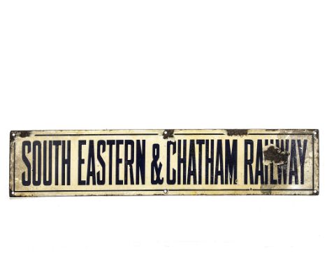 A Pre-Grouping 'South Eastern & Chatham Railway' Enamel sign: measuring approx 27" x 6", the lettering in deep cobalt blue on