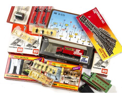 A Quantity of HO Scale figures Fleischmann Signals and other equipment: including 17 boxes of figures by Preiser, 6 Fleischma