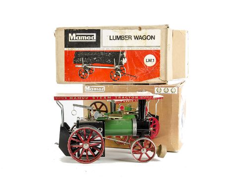 A Mamod TE1a Tablet-fired Live Steam Traction Engine and LW1 Lumber Wagon: in green, ivory and red with burner tray, scuttle,