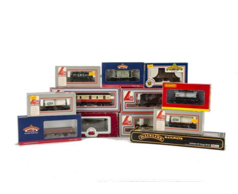 An assortment of Bachmann Lima and other 00 Gauge Rolling Stock:  including Bachmann Tube wagon, Brake Van and Fruit Van, Hor