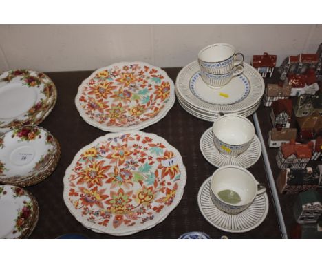 A quantity of Wedgwood "Edme" pattern teaware and side plates; and a quantity of Copeland Spode plates