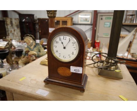 An Edwardian mantel clock with key