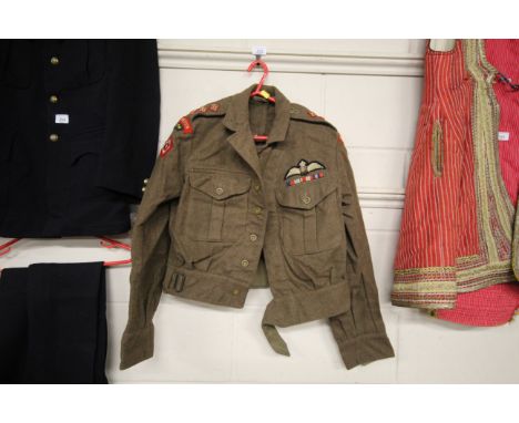 A battle dress blouse with RAF badge, 9th Battalion