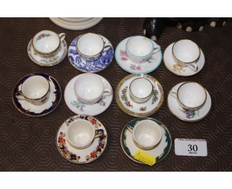 A quantity of miniature cups and saucers to include Coalport, Spode, Mason etc.