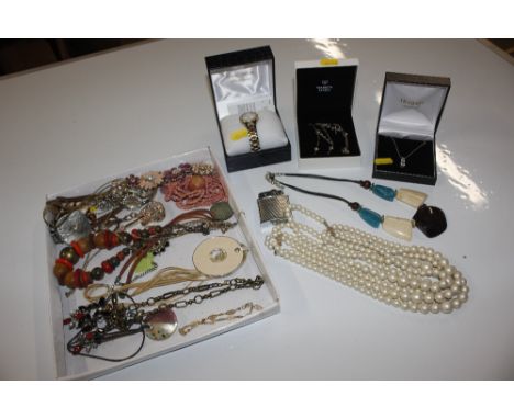 A box of various costume jewellery to include bead necklaces, wrist watches, cigarette lighter, etc. 