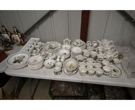 A large quantity of Portmeirion teaware, dinnerware, trays, mantel clock 
