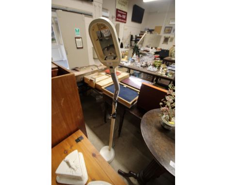 A floor standing flexible reading lamp