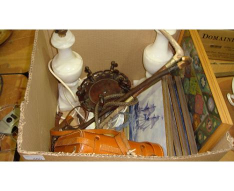Box of oddments including pictures prints, table lamp, silver mounted riding crop etc. etc.