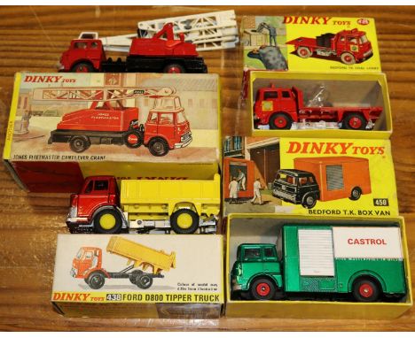 4 Dinky Toys Trucks. Bedford TK Coal Lorry (425). With 5 coal sacks and scales. Ford D800 Tipper Truck (438). Bedford TK Box 