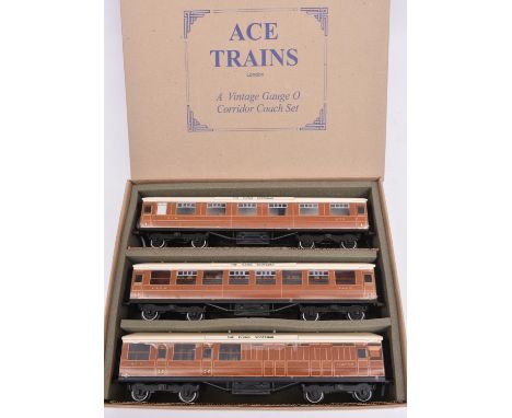 An Ace Trains O gauge LNER C/4 Set B 3 coach set in teak livery. Full First, Full Third and Brake Third. All with 'The Flying