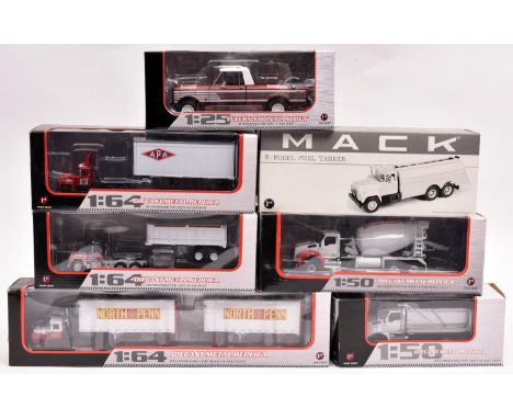 7 First Gear American Vehicles. 1:25, 1:50 and 1:64 scale examples. An International Scout without hard-top. 2x Kenworth T880
