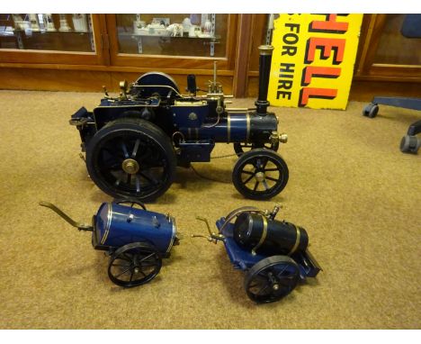 A gas fired live steam Markie 1:10 scale Road Locomotive. Single cylinder, hand pump, reverser, safety value, whistle, etc. B