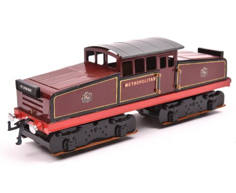 An O gauge electric tinplate Metropolitan Railway Westinghouse Bo-Bo electric locomotive, 5, in lined maroon livery.  This mo