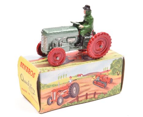 A scarce Benbros Qualitoy 'Farm Equipment' Ferguson Tractor. Painted in metallic green hammered enamel finish with red wheels