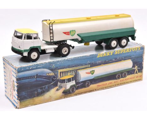 A French Dinky Supertoys Tracteur Unic Avec Semi-Remorque 'Air BP'. In white, yellow &amp; green with white wheels. Boxed, so