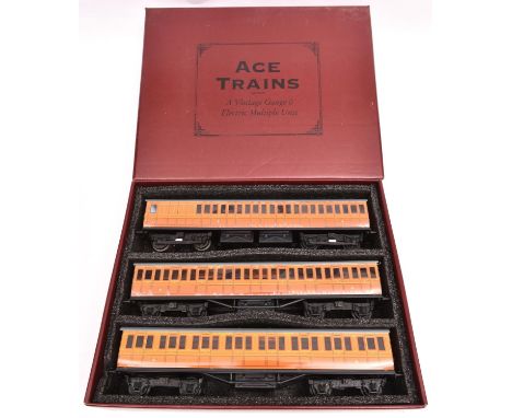 An Ace Trains O gauge Metropolitan Railway EMU 3-car set in teak livery. Full First, Full Third and Brake Third with pick-ups