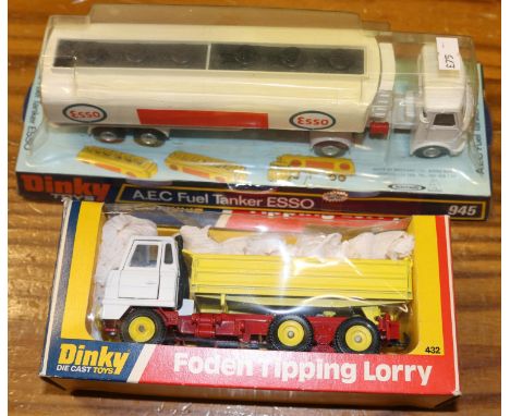 2 Dinky Toys Trucks. Foden Tipping Lorry (432). White cab, red chassis, with yellow body and wheels. AEC Fuel Tanker Esso (94