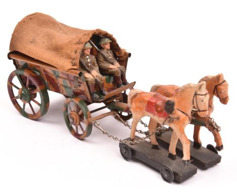 An Elastolin British Army WW1 Supply Wagon. A 4-wheel covered wagon in camouflage livery, with two British soldiers. Two hors